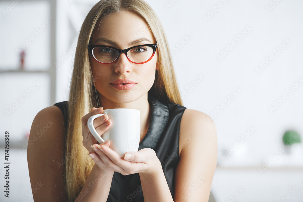 Canvas Prints Confident female drinking coffee