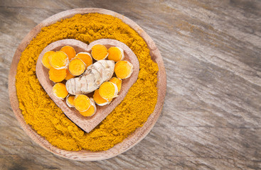 Roots and turmeric powder - Curcuma longa