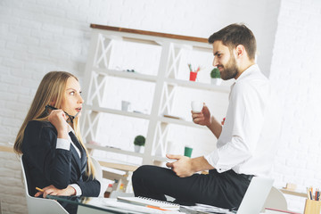 Fototapeta premium Thoughtful man and woman working on project
