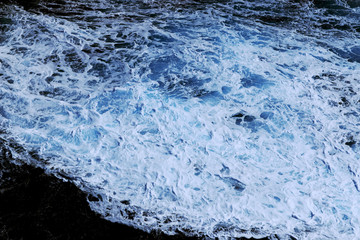 Sea water hitting the ship