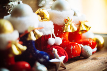 Pair of Santa boots on gold background