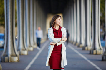 Obraz premium Woman in Paris on a bright fall day