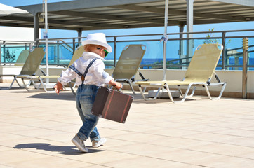 Young  traveler with a suitcase