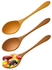 Wooden spoons with mixed fruit