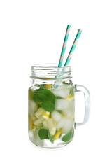 Cold fresh mojito with mint and lemon slices in mason jar on white background