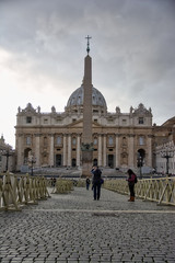 Fototapeta premium Vatican Exterior Few People Tourists Walking Around Grey Skies