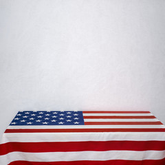 American flag table near the white stucco wall