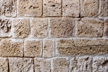 texture of wall from an old badly worked stone