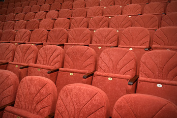 Red empty seats in the theatre