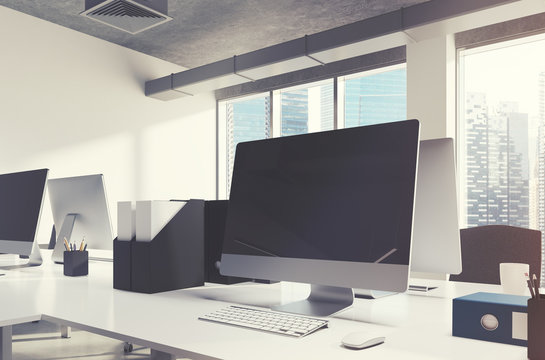 Blank screen computer monitor in office