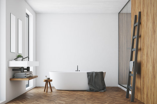 White and wooden bathroom, white tub