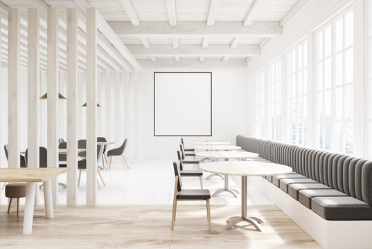 White wooden cafe with gray sofas, poster