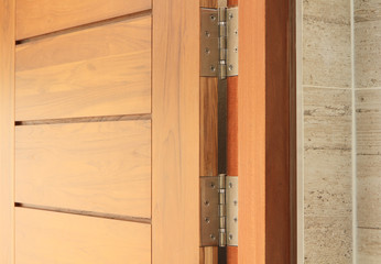 Wooden door with hinge
