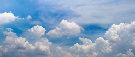 blue sky full with cumulus clouds