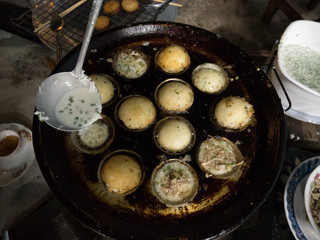 the way we cook Sweet and Savory Grilled Coconut-Rice Hotcakes it's what Lao people called 