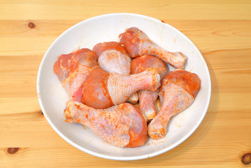 Raw chicken drumstick.