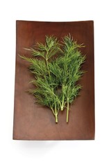 Dill (Anethum graveolens) in a wooden bowl
