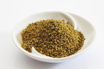 Lemon pepper spice blend in a small porcelain bowl