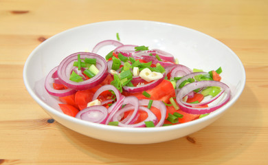 Vegetable salad on plate.