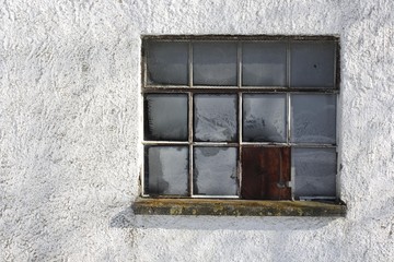 Old window at a house wall