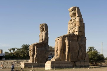 Fototapeta na wymiar Colossi of Memnon, guard figures, Thebes West, Luxor, Egypt, Africa