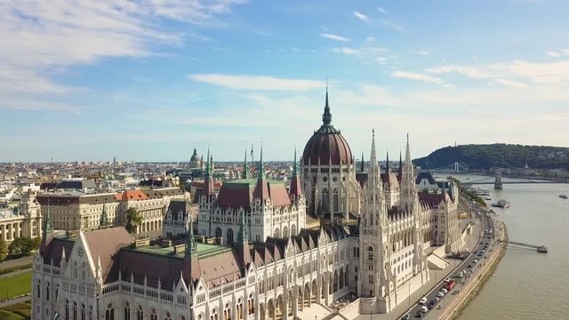 Aerial footage from a drone shows the historical Buda Castle near the Danube on Castle Hill in Budapest, Hungary. Bridge on the river. Aerial view.
