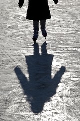 Girl, approximately 10 years old, back light, ice skating, Hesse, Germany, Europe