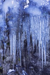 Frozen waterfall near Grotfjorden and Tromvik, Norway, Europe