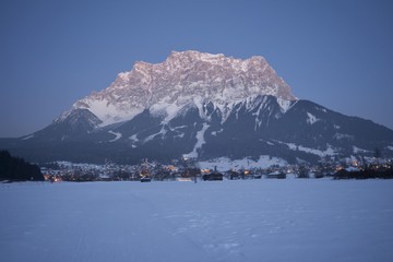 View towards Zugspitze mountain and the small town of Ehrwald at dusk, Tyrol, Austria, Europe