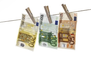 Euro banknotes on a clothesline