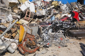 Pile of discarded household and industrial items at a scrap metal recycling centre, Quebec, Canada, North America