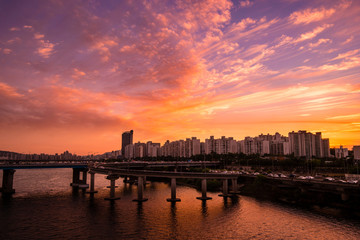 Fototapeta premium Sunset landscape between Hangang road and apartments where the intersection of Seoul and South Korea is visible.