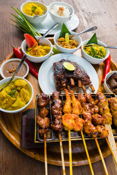 Traditional balinese sea food with satay and curry in Bali, Indonesia