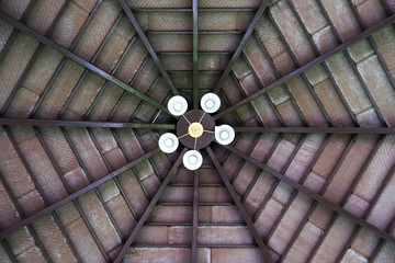 Bulb light on the wood ceiling which have traditional style