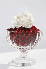 Dessert cup, cranberries and cream