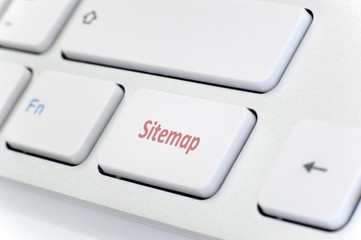 Modern white keyboard with red word 
