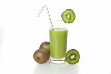 Kiwi fruit drinking yoghurt, kiwi shake in a glass and kiwi fruit