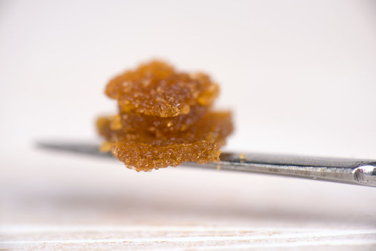 Cannabis concentrate live resin (extracted from medical marijuana) on a dabbing tool