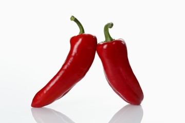 Two red Pointed peppers (Capsicum)
