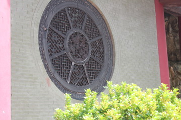 Circle Window in a Buddhist Temple in Guangdong China Asia