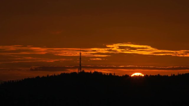 Ultra high definition 4k time lapse movie of beautiful closeup orange glow sunset over Mt. Scott in Happy Valley Oregon 3840x2160