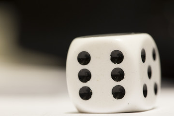 White six-sided die showing the number six.