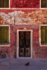 Fototapeta na wymiar Facade of a building in Venice, Italy