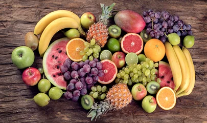 Wall murals Fruits Fruits background. Healthy diet eating concept
