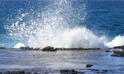 Waves hitting rocks