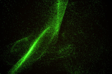 Abstract background made of green glowing particles