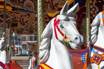 Fototapeta na wymiar Old carousel with horses, detail view