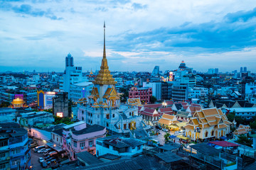 Naklejka premium Bangkok cityscape skyline, Thailand. Modern tower and local building, temple at twilight evening