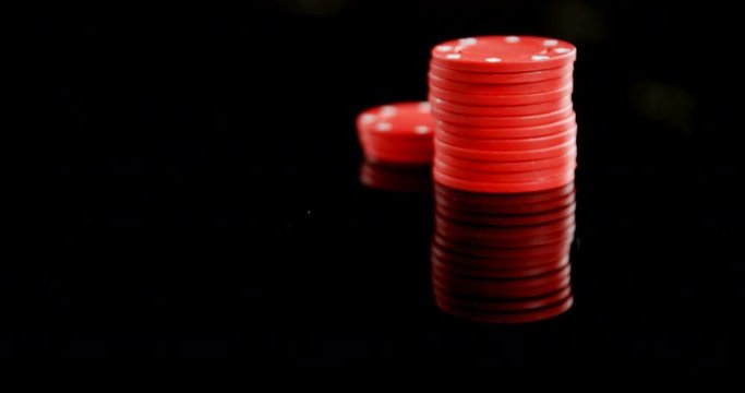 Playing cards and casino chips on poker table 