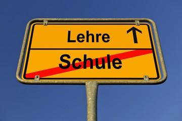 Sign, city limit, symbolic image for the transition from Schule or school to Lehre or apprenticeship